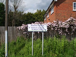 Bi-directional sign at Watford North station